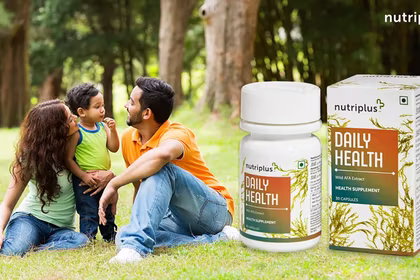 A happy family in the Park with Nutriplus Daily Health in frame