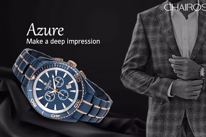 CHAIROS Azure watch with a stylish man in a suit in the background.