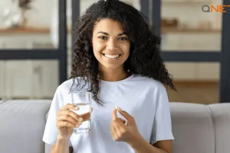 A young lady consuming Nutriplus-health supplements