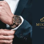 A young man in a suit wearing Mugnier watch