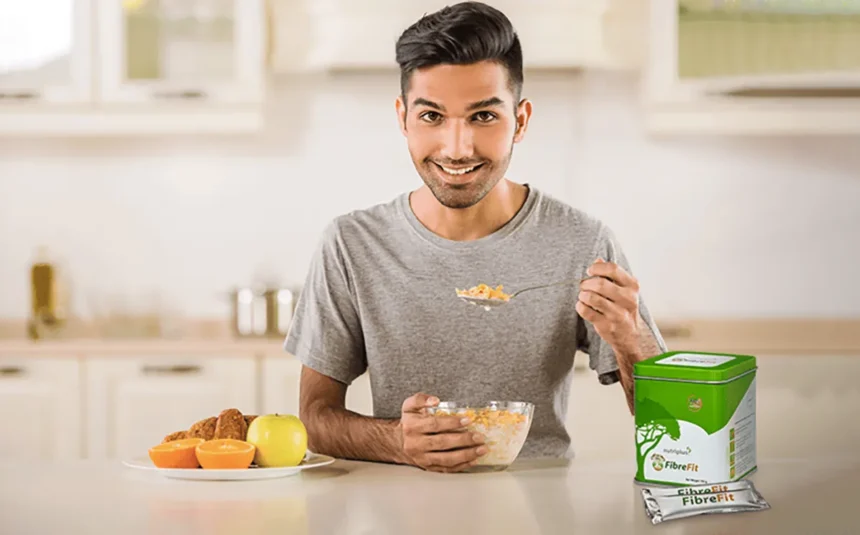 A young man eating healthy food with Fibre Fit