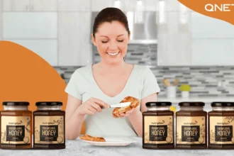 A young lady preparing breakfast featuring Nutriplus Monofloral Honey
