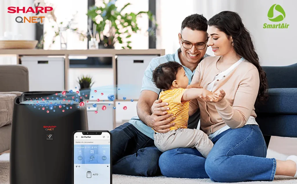 A happy family breathing fresh air with SHARP-QNET SmartAir air purifier in their home
