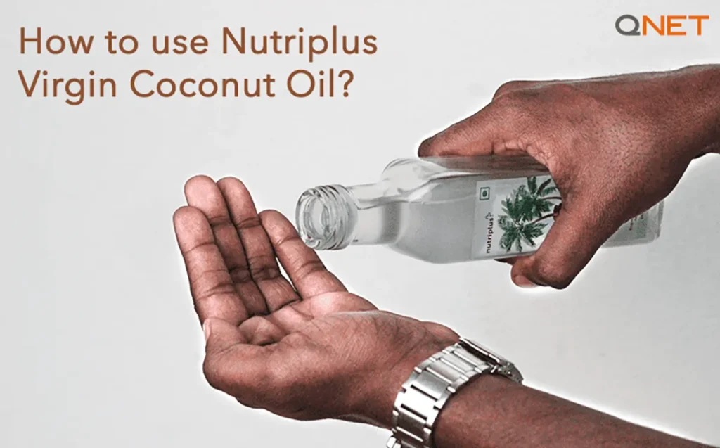 A man pouring Nutriplus Virgin Coconut Oil in his palm for a head massage