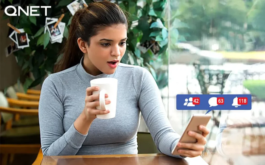 A young woman working on her social media page