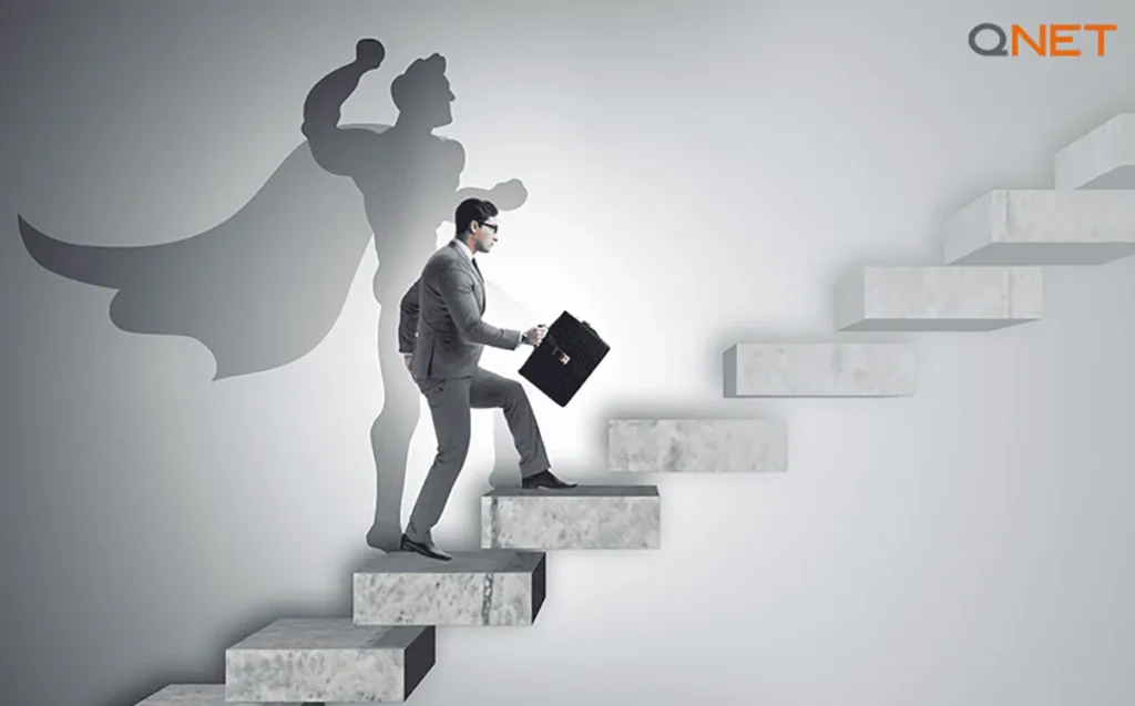 An entrepreneur climbing up a staircase in a depiction of overcoming challenges in business