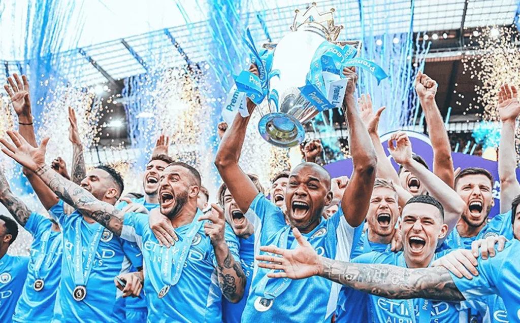 Manchester City players celebrate after winning their 6th Premier League title in 2021-22