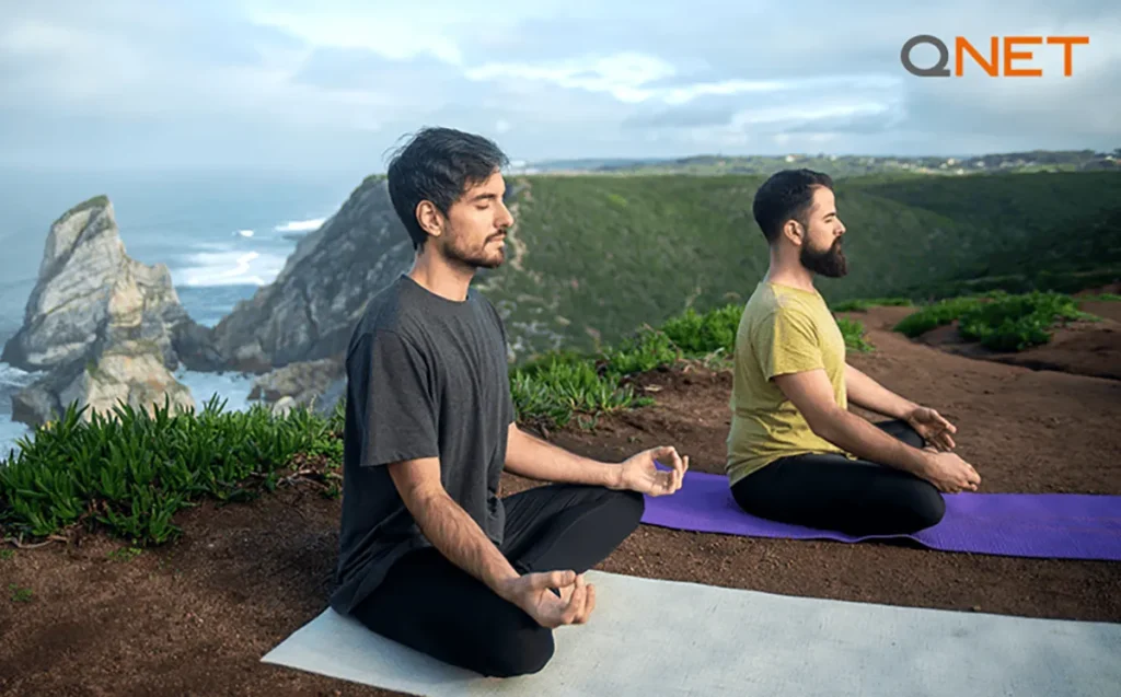 Two health enthusiasts meditating on the occasion of international yoga day
