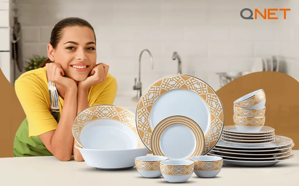 A woman smiling and presenting the Oritsu Aristo Dinner Set kept on a table