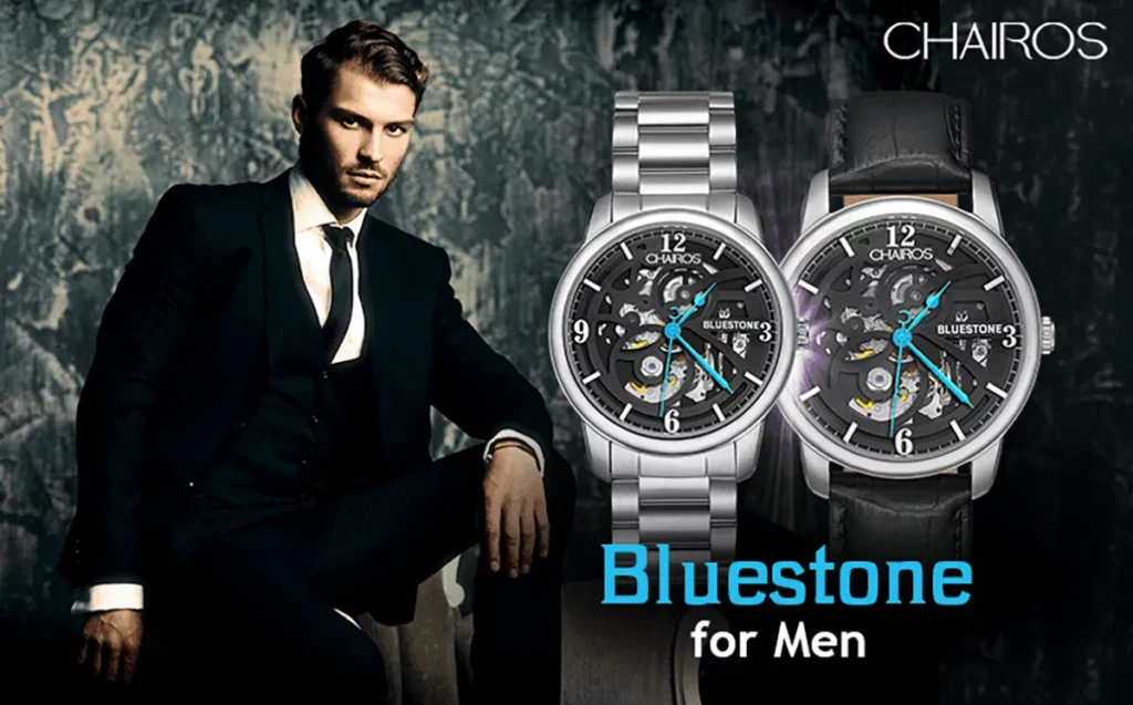 A young man in a suit with CHAIROS Bluestone watch by QNET in the frame