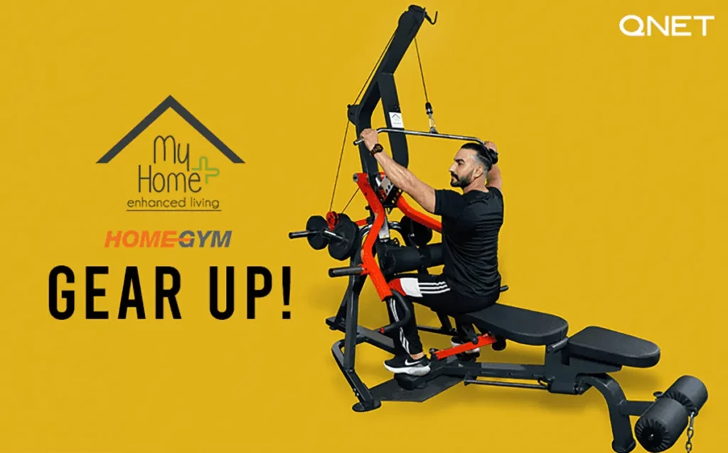 A young man performing lateral pull down at home on the MyHomePlus HomeGym