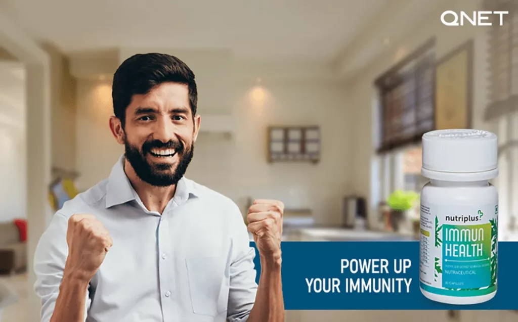 A young man standing with arms raised in his home with Nutriplus ImmunHealth in the frame to boost immunity and improve health