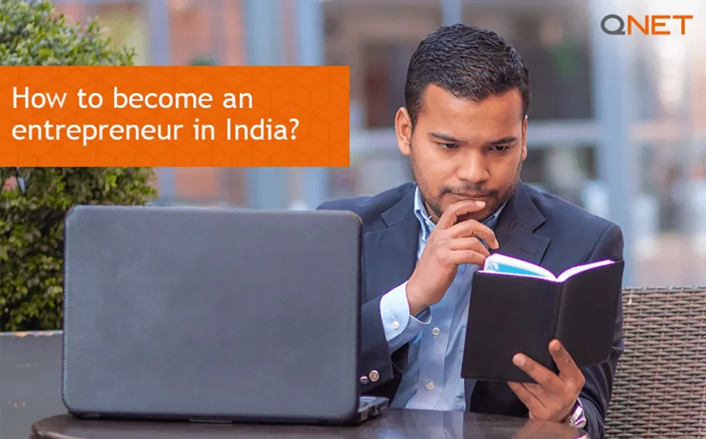 A young man wondering how to become an entrepreneur in India while reading notes from a notebook