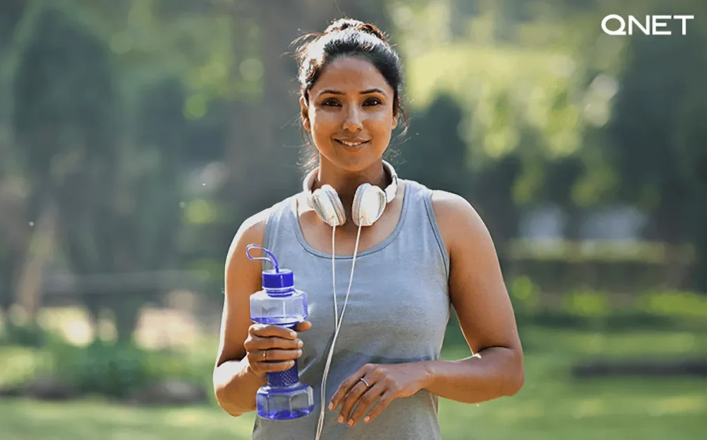 An Indian diabetic woman adopting a healthy lifestyle by exercising outdoors