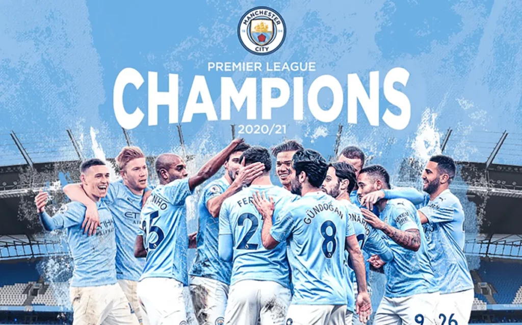 Manchester City players celebrating their Premier League title victory for the season 2020/21.