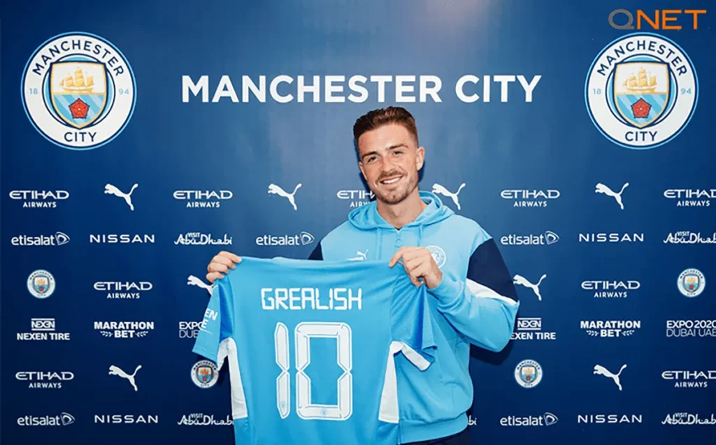 Manchester City’s new signing, Jack Grealish, holding the City shirt during the player presentation