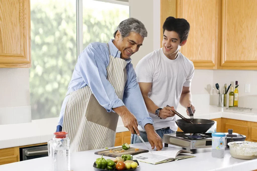 Father's Day: Father and son cooking together