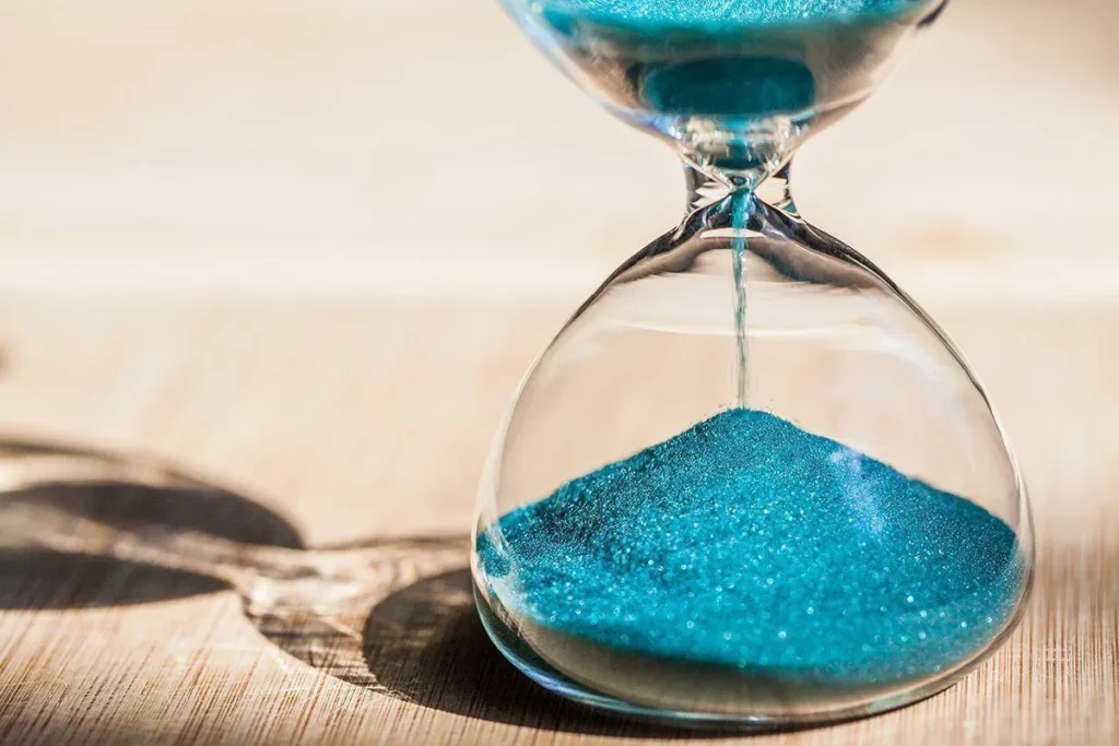 networking skills - hourglass shows patience as time passes by