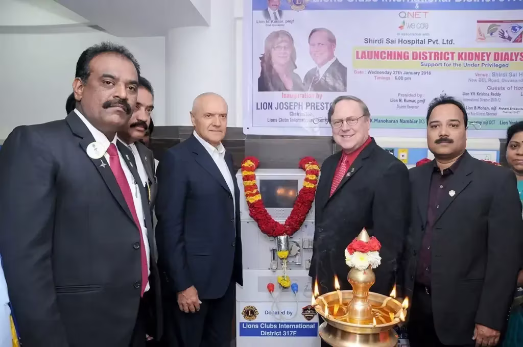 QNET India and Lions Club officials donating a Kidney Dialysis Unit in Banglore qnet india and lions club donate kidney dialysis machine