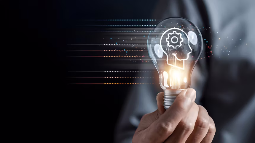 man holding light bulb